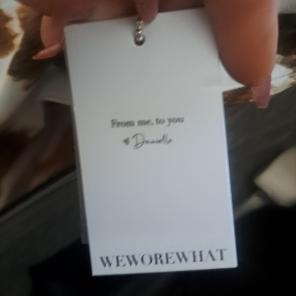 WeWoreWhat stiletto slit cow print jeans. - Picture 7 of 7